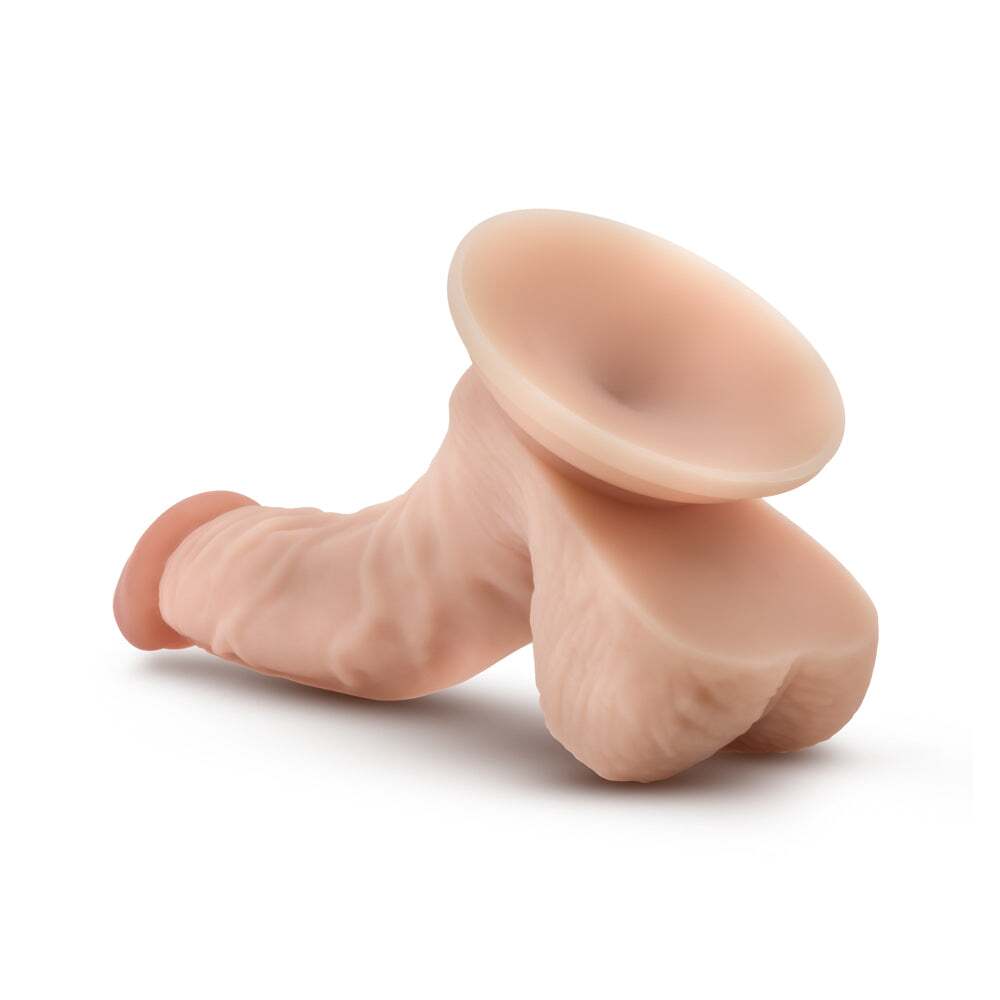 6.5 inch Dildo by Blush in Vanilla Ivory Beige shown for pegging Her or Him