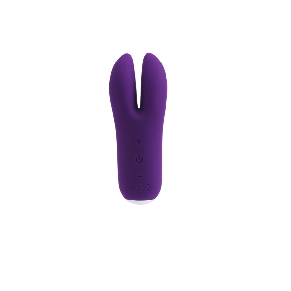 Purple VeDO vibrator Kitti Dual shown in hand for scale