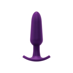 Purple VeDO vibrator Bump PLUS Anal shown in hand for scale