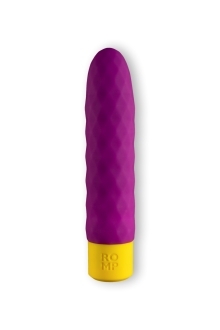 Purple ROMP vibrator Beat shown in hand for scale