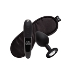 Fifty Shades of Grey vibrator Fifty Shades X We- Come to Bed 3pc Couple's Kit shown in hand for scale