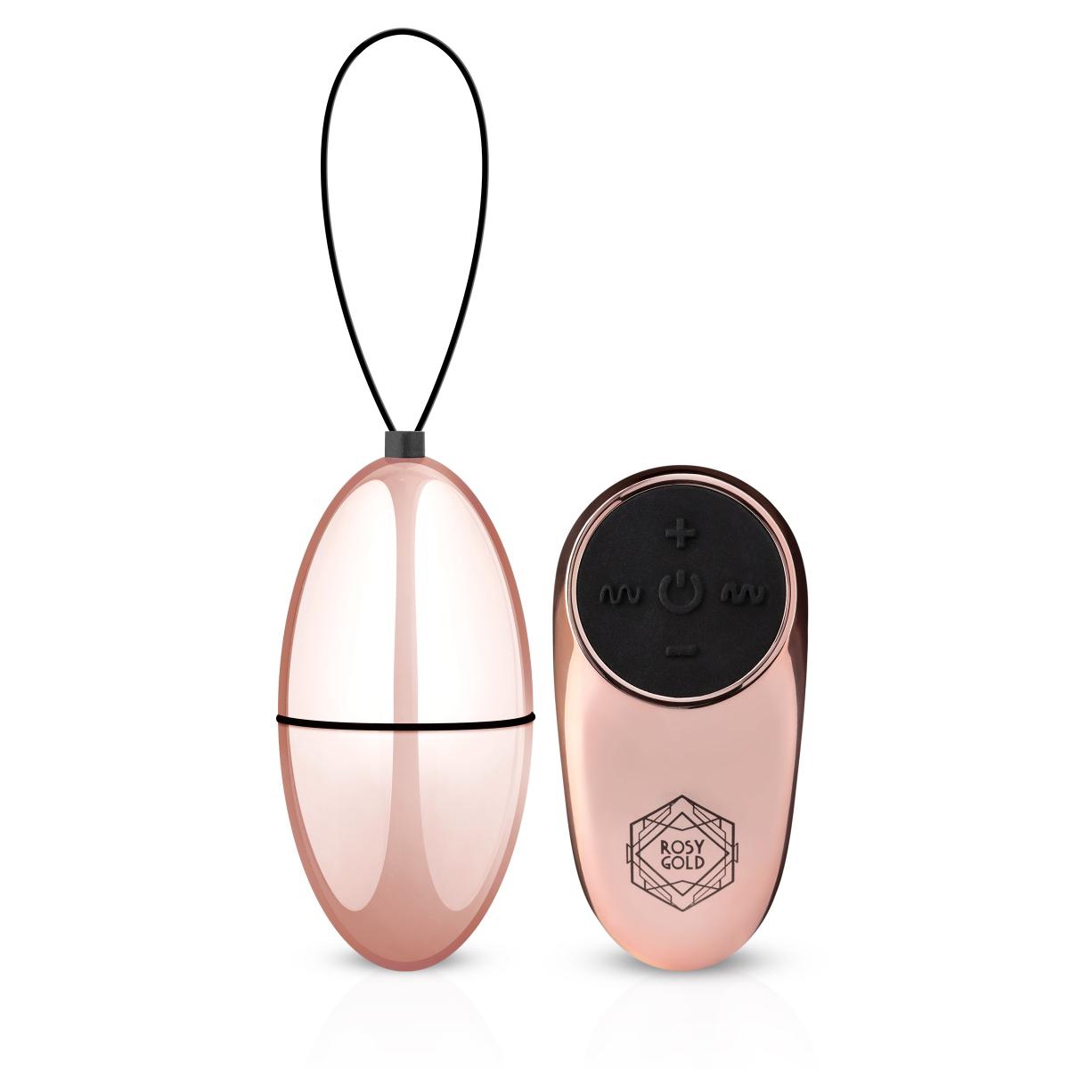Gold Rosy Gold vibrator Nouveau Egg shown in hand for scale