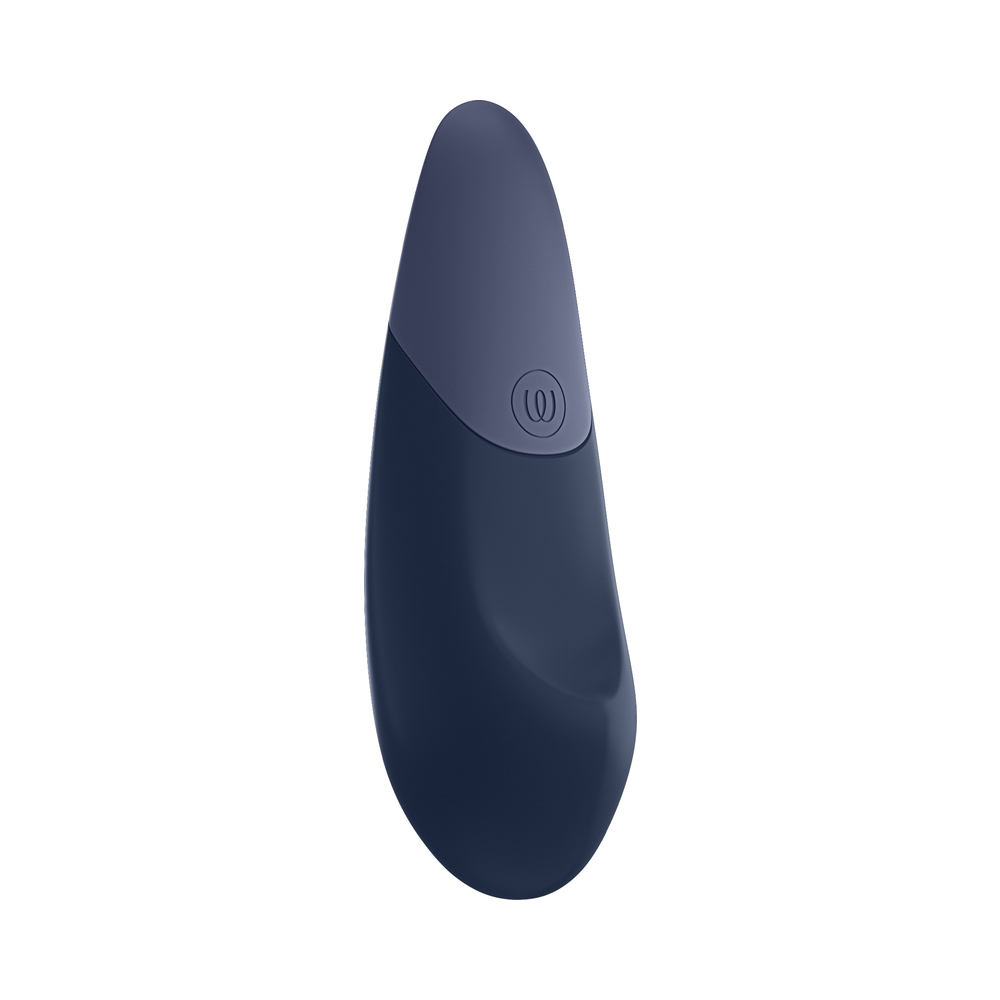 Dark Blue Womanizer vibrator Dark shown in hand for scale
