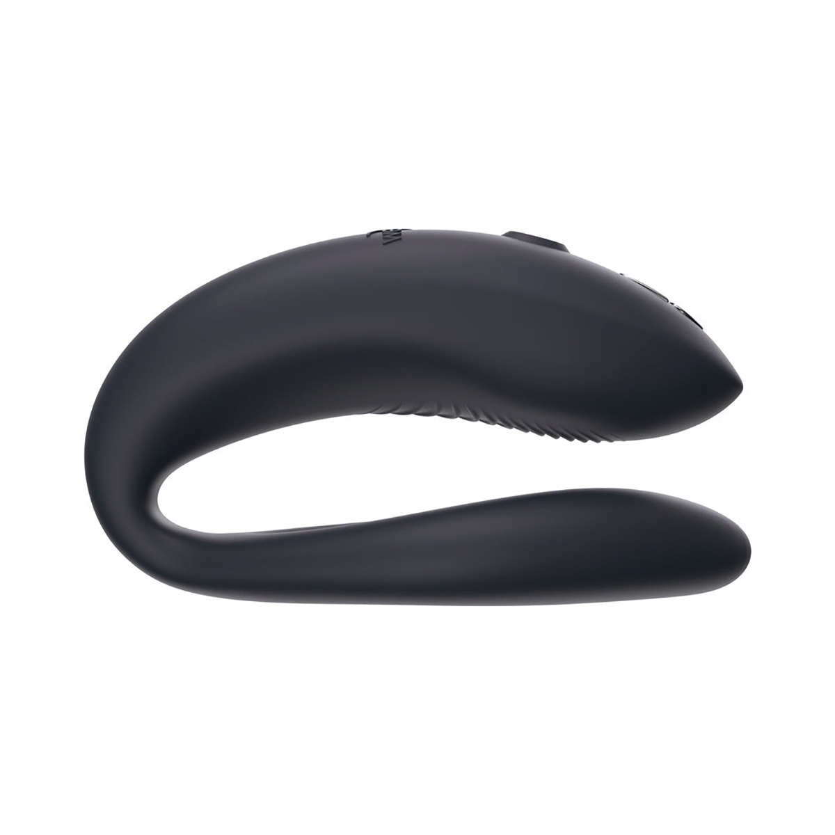 Lifestyle shot featuring the Black Womanizer vibrator beside the bed