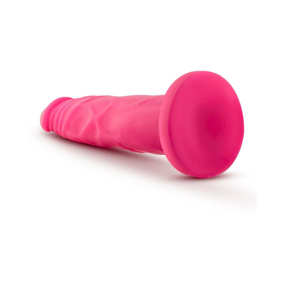 7.5 inch Dildo by Blush in Hot Pink Magenta Fuchsia shown for pegging Her or Him