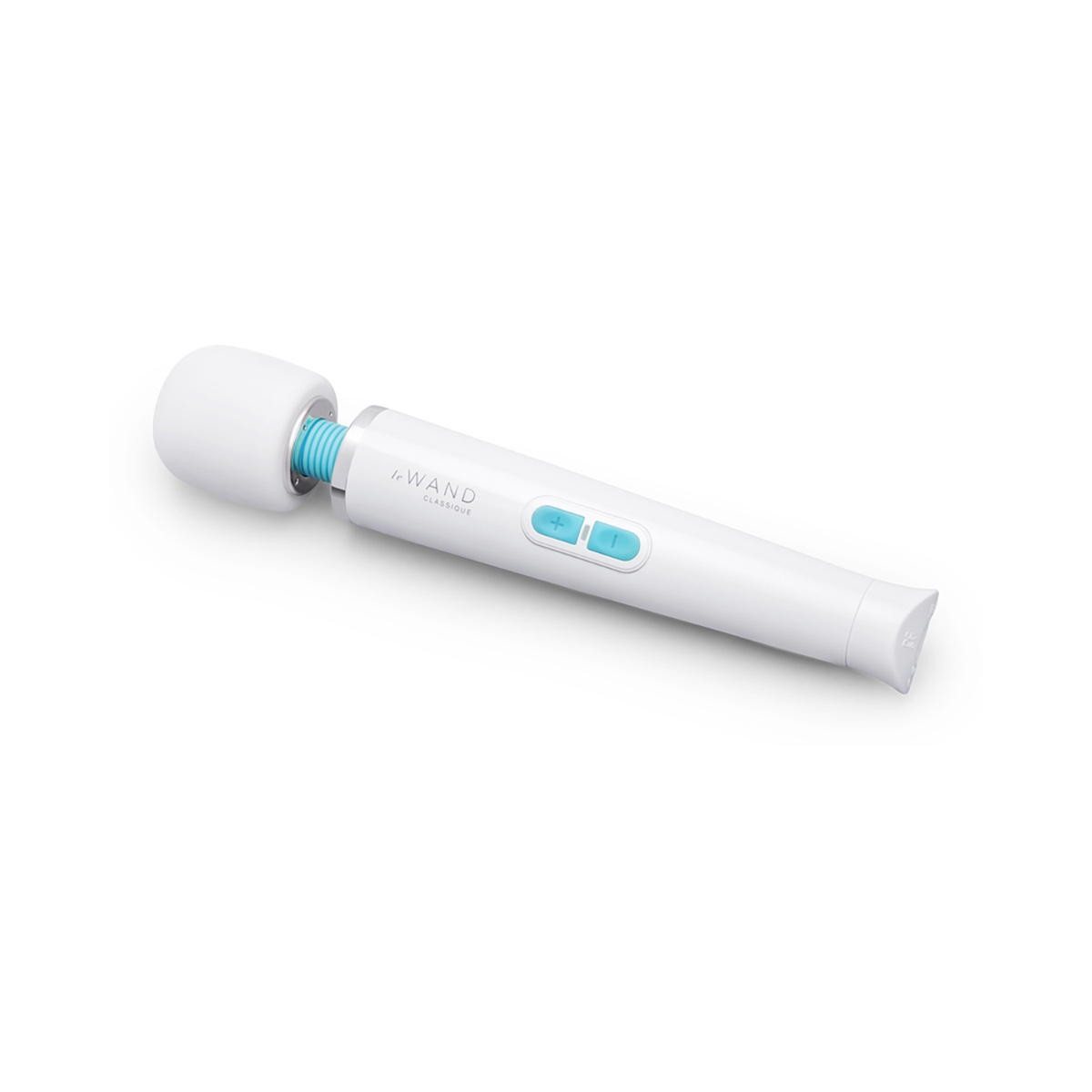 The  Le Wand vibrator resting on soft fabric surface