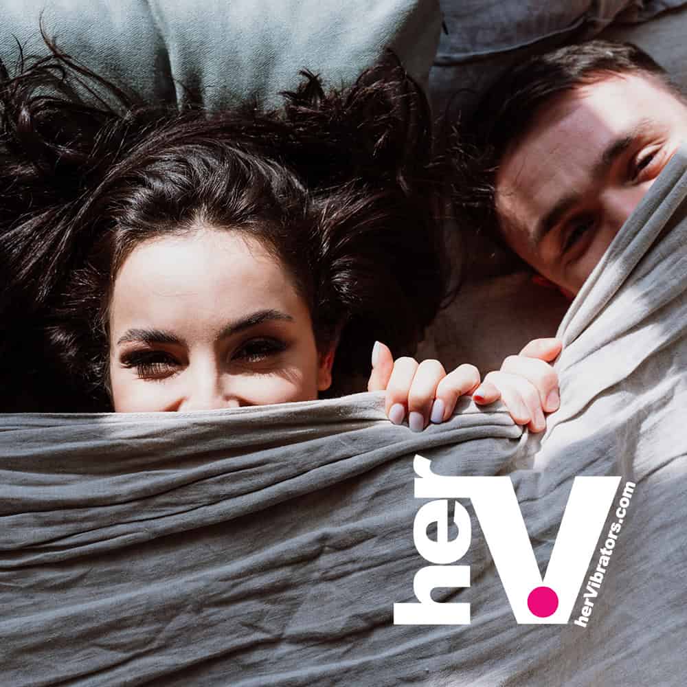 Couples vibrator - cozy scene under the covers