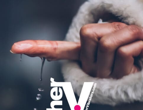A finger catching water droplets, personal lubricant.