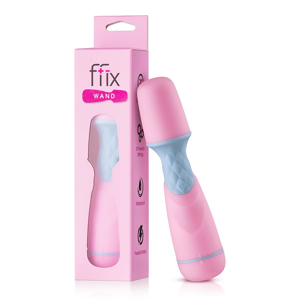 Pink Femme Funn vibrator FFIX Mini shown in hand for scale
