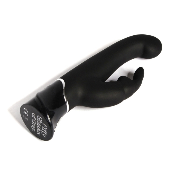Fifty Shades of Grey vibrator Fifty Shades Greedy Girl Rechargeable G-Spot Rabbit shown in hand for scale