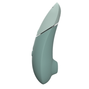 Womanizer vibrator Next Sage shown in hand for scale