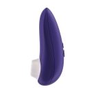 Womanizer vibrator Starlet 3 Indigo shown in hand for scale