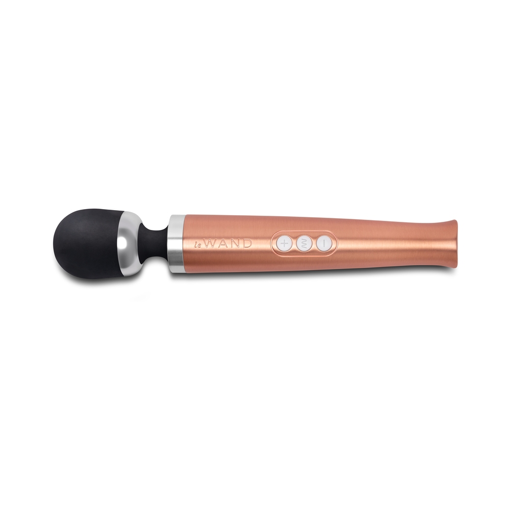 Rose Gold Le Wand vibrator Die Cast Rech Rose shown in hand for scale