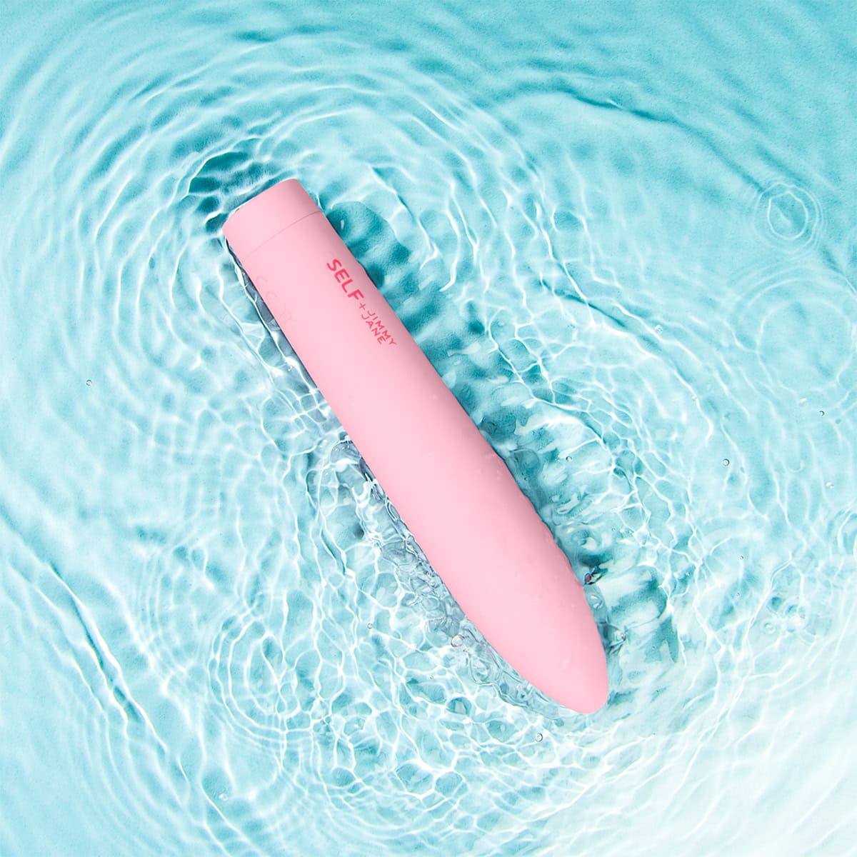 Buy a SELF + Jimmyjane Vibrating Slimline Massager vibrator.