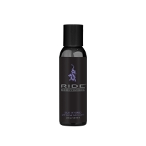Bottle of 2 oz Vegan Lube Sliquid showing plant-powered formula