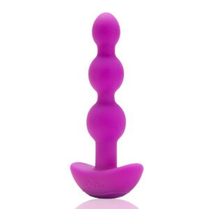 B-Vibe vibrator Triplet Beads Fuchsia shown in hand for scale