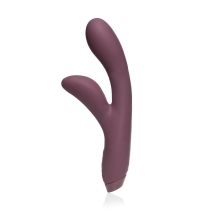 Purple Je Joue vibrator Hera Rabbit shown in hand for scale