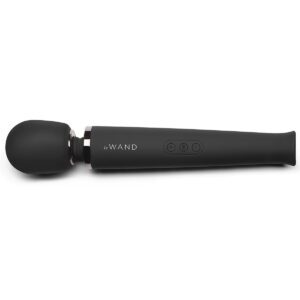 Black Le Wand vibrator  shown in hand for scale