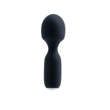Black VeDO vibrator Wini Mini shown in hand for scale
