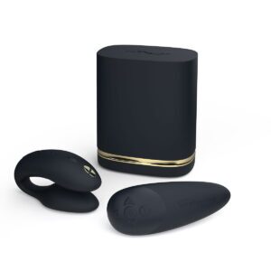 Black We-Vibe vibrator Golden Moments 2 shown in hand for scale