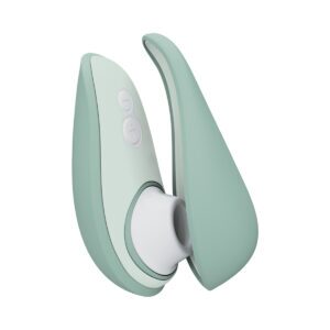 Womanizer vibrator Liberty 2- Sage shown in hand for scale