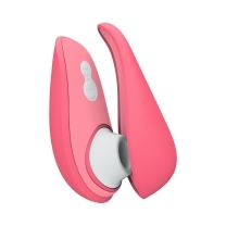 Womanizer vibrator liberty 2- vibrant rose shown in hand for scale