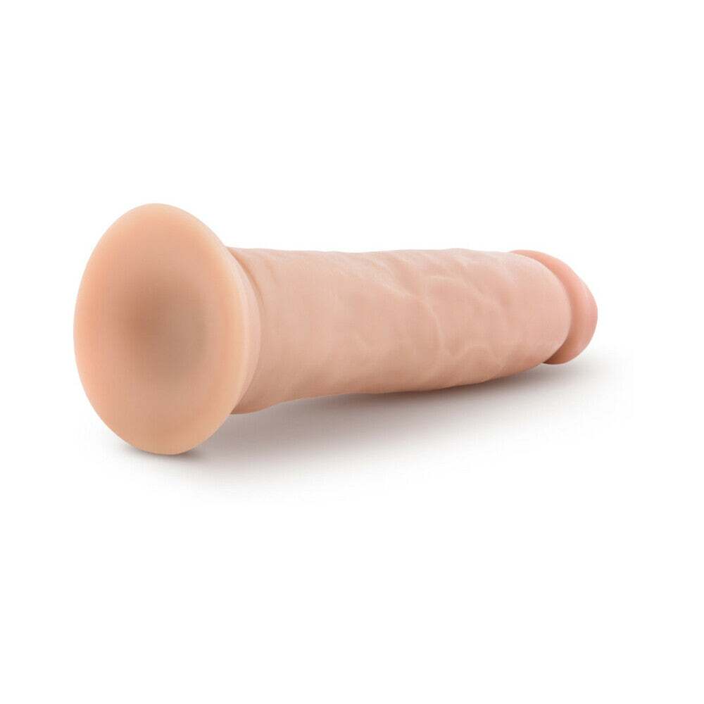 9 inch Dildo by Blush in Vanilla Ivory Beige shown for pegging Her or Him