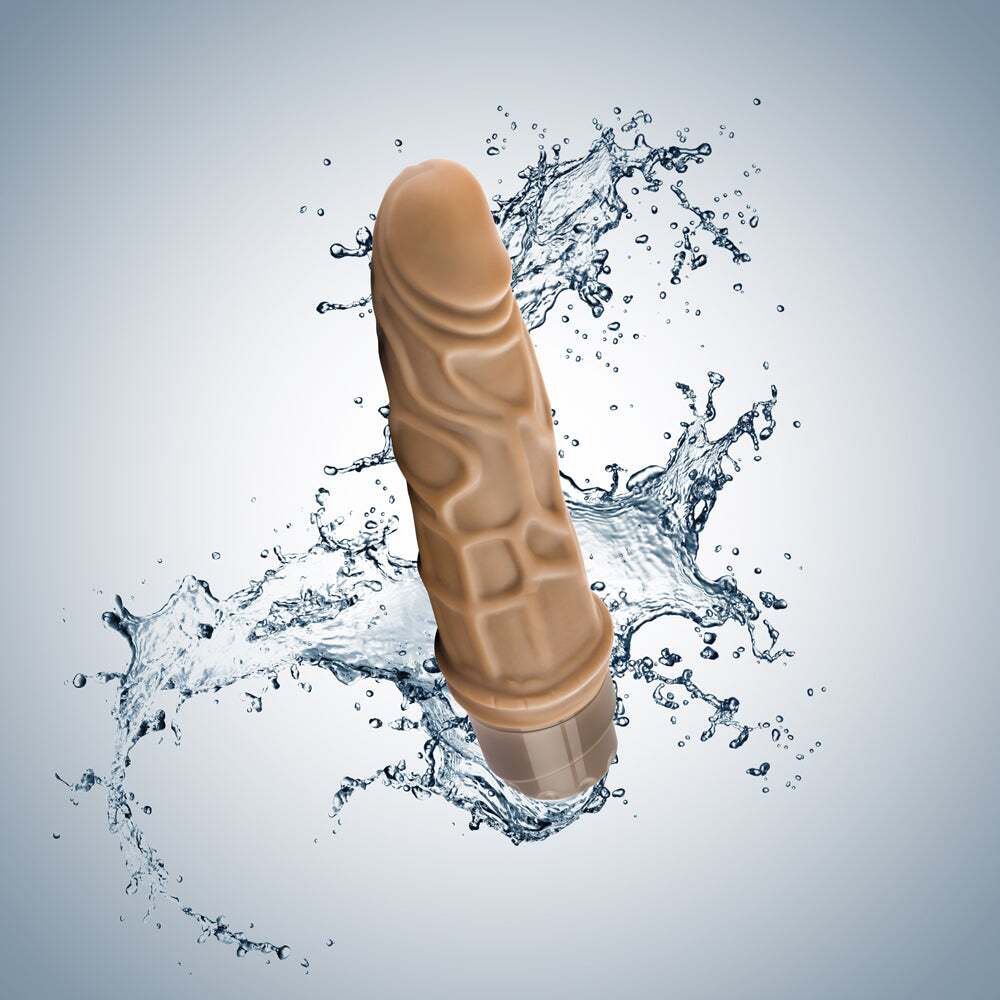 7.25 inch Dildo by Blush in Tan Light Brown Mocha displayed for pegging Him or Her