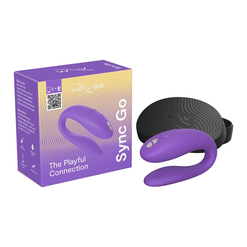 Purple we-vibe vibrator sync go- light shown in hand for scale