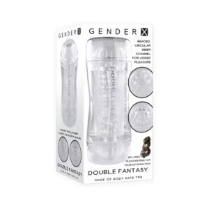 Gender X vibrator GX DoubleFantasy DualEntry Stroker Clear shown in hand for scale