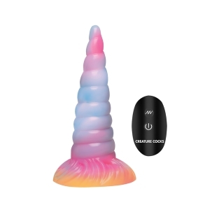 XR Brands vibrator Creature Cocks Unicorn GITD Vib Dildo shown in hand for scale