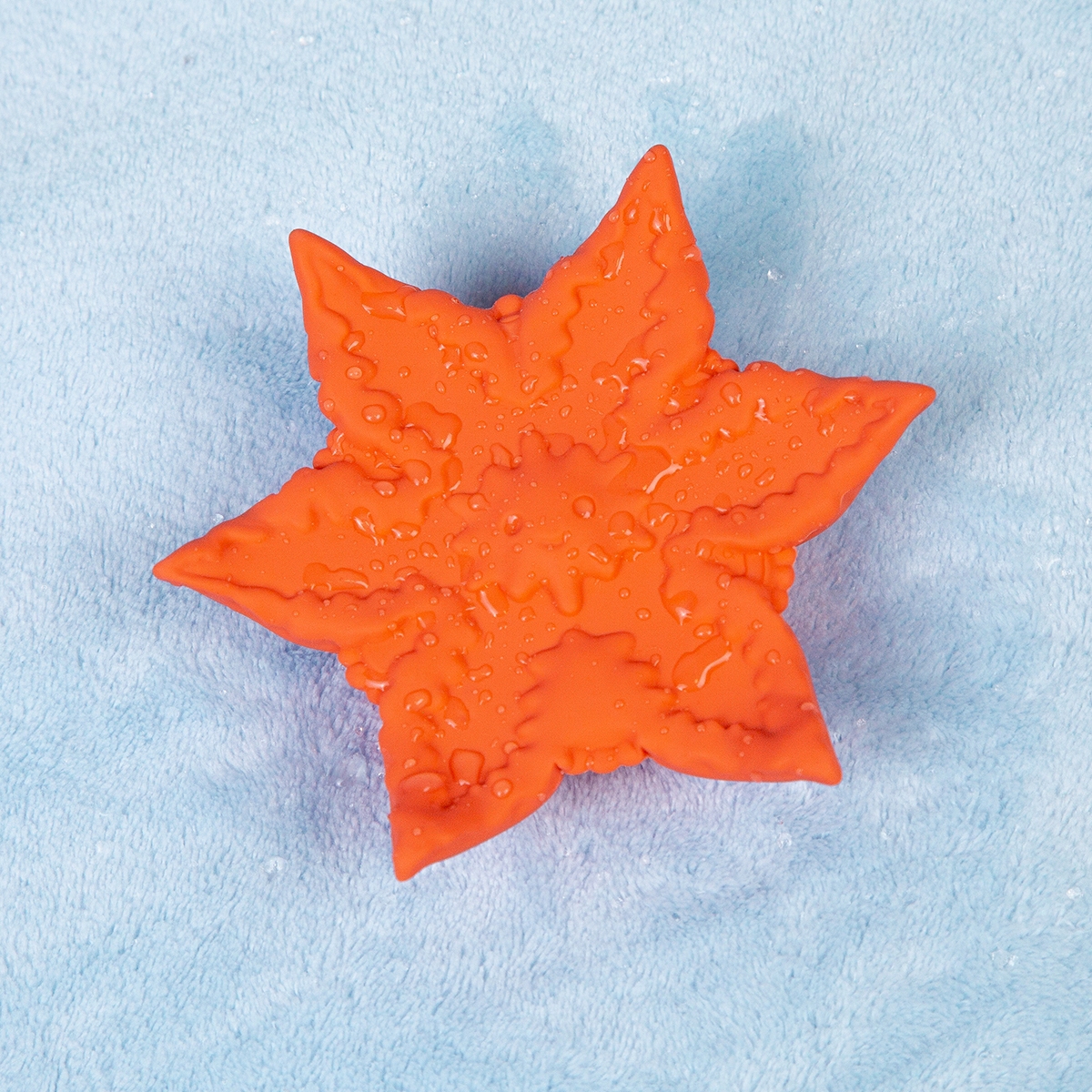 Close-up of the Coral Cute Little Fuckers vibrator for texture detail