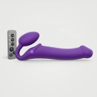 Purple Strap-On-Me vibrator Large shown in hand for scale