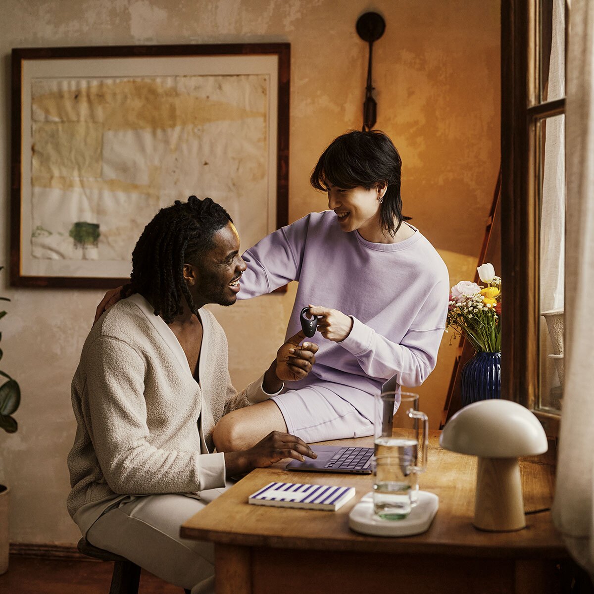 Bond shown in hand for scale