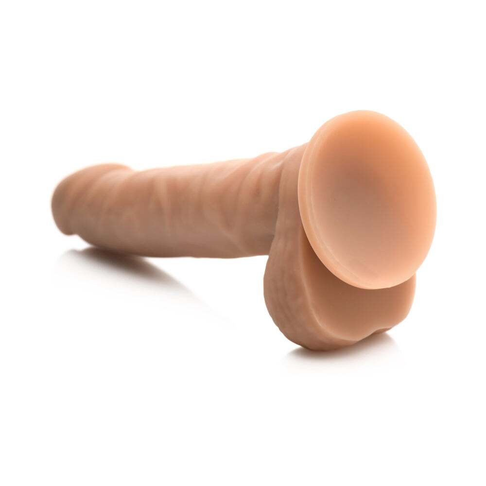 7 inch Dildo by Curve Novelties in Tan Light Brown Mocha displayed for pegging Him or Her