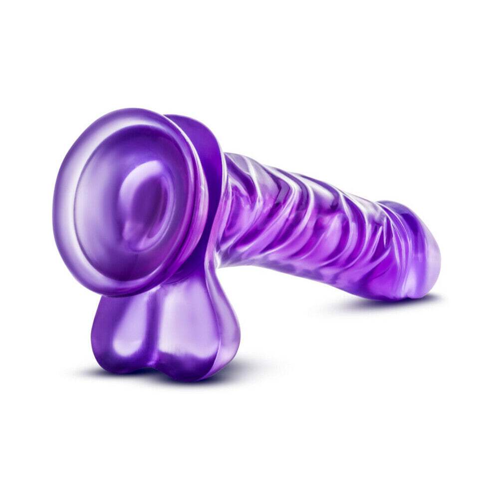 9 inch Dildo by Blush in Purple shown for pegging Her or Him