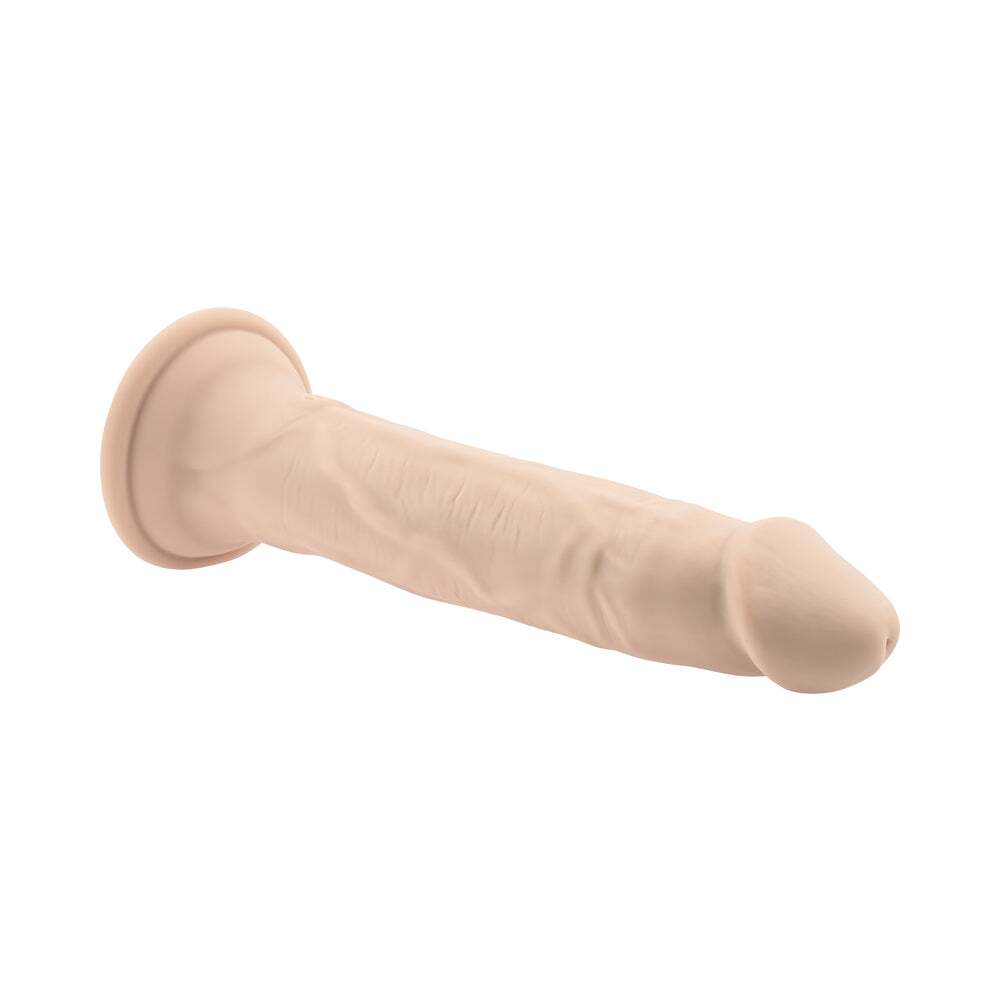 Dildo by Evolved in Vanilla Ivory Beige displayed for pegging Him or Her