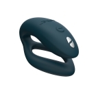 Green We-Vibe vibrator Sync O Velvet shown in hand for scale