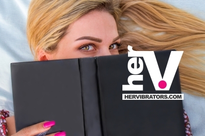 stack of anal sex books arranged neatly to represent educational guides for safer more pleasurable anal play