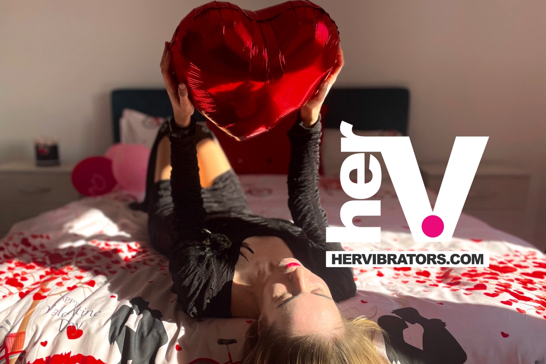 Romantic bedroom with warm lighting, candles, soft textures, and valentine’s day décor creating a sensual atmosphere