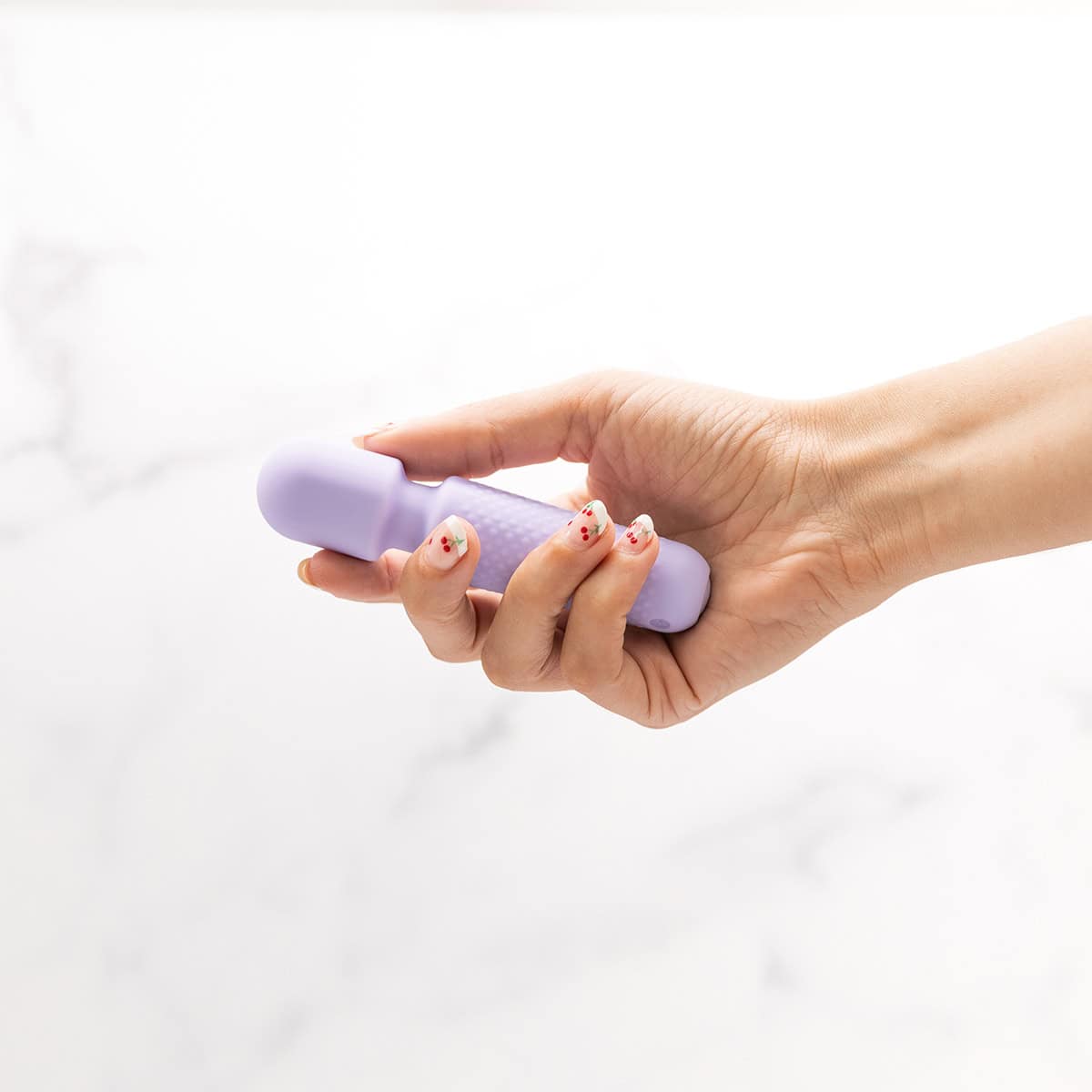 Buy a Emojibator Tiny Wand Vibrator  Lavender vibrator.