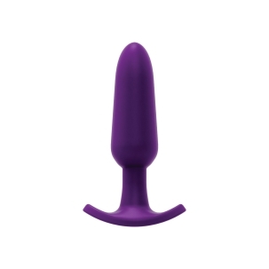 Purple VeDO vibrator Bump PLUS Anal shown in hand for scale