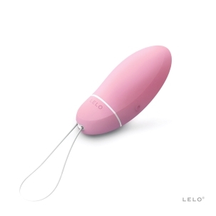 Pink LELO vibrator Smart Bead shown in hand for scale