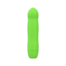 Green B Swish vibrator Bdesired Infinite Deluxe- Paradise shown in hand for scale