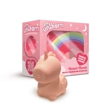 Pink Creative Conceptions vibrator Unihorn Heart Throb shown in hand for scale