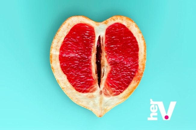 Symbolic grapefruit illustration representing huge clit anatomy, big clitoris size variation, and enlarged clitoris diversity in female sexual wellness education
