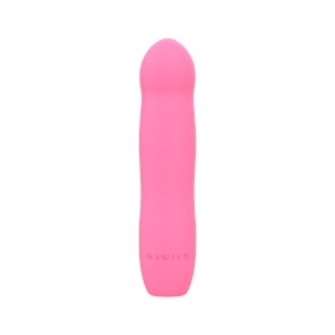 Pink B Swish vibrator Bdesired Infinite Deluxe LE- Flamingo shown in hand for scale