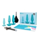B-Vibe vibrator Anal Training Set shown in hand for scale