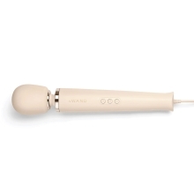 Cream Le Wand vibrator Corded shown in hand for scale