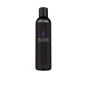 Bottle of 8.5 oz Vegan Lube Sliquid showing plant-powered formula